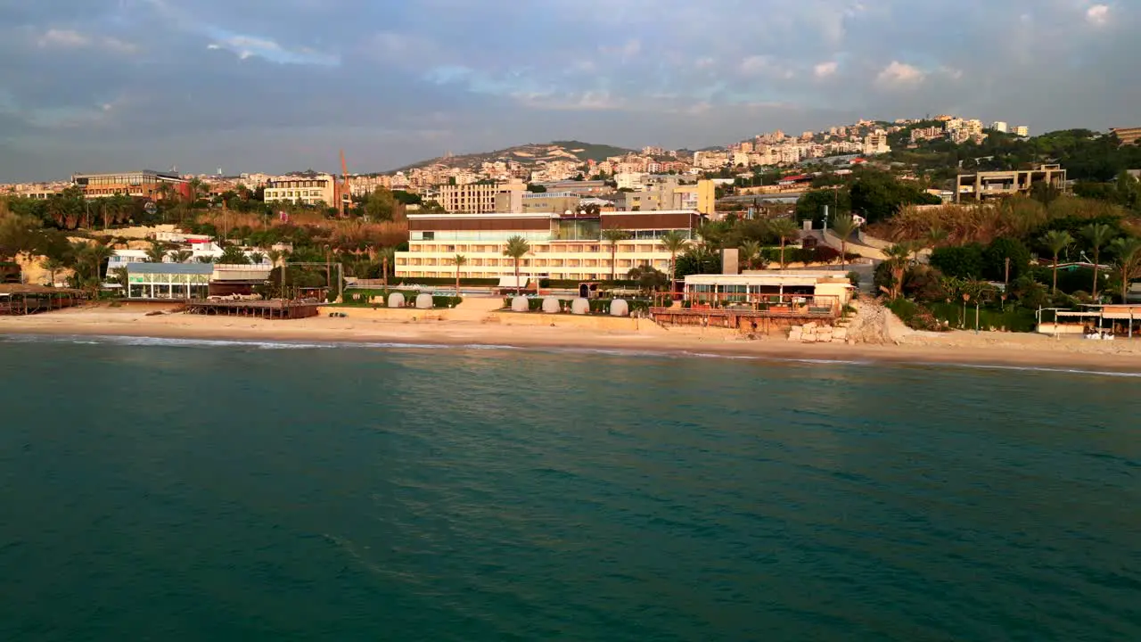 Drone shot Mediterranean Sea with coastal city