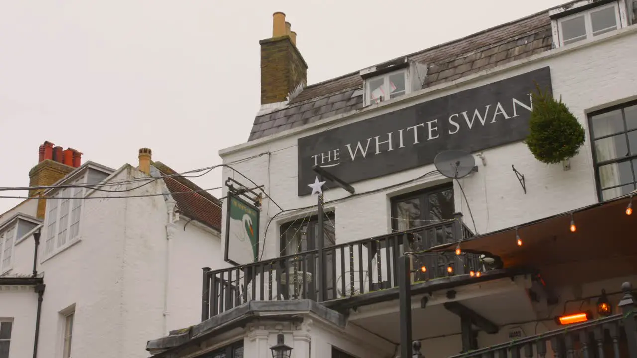 Low angle shot of The White Swan Restaurant in Twickenham London suburbs England on a cloudy day