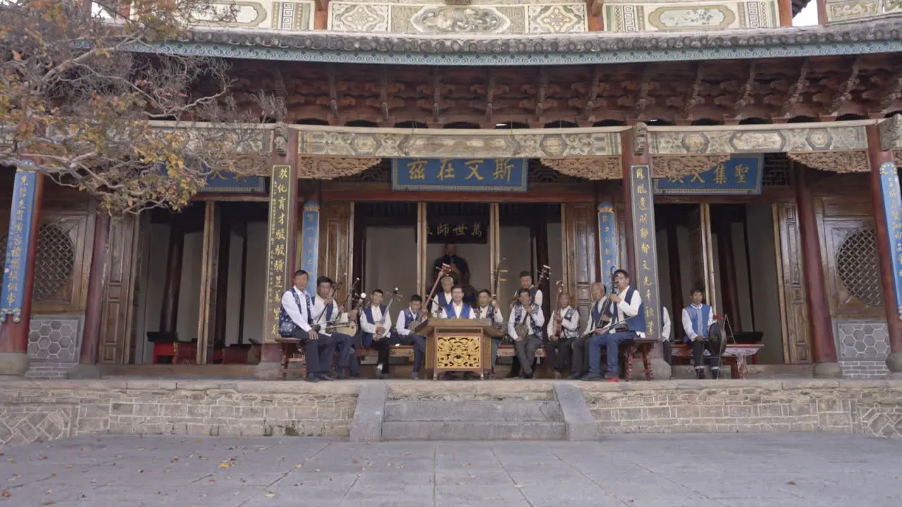 Bai Minority Group Performing Music at Chinese Temple in Yunnan China