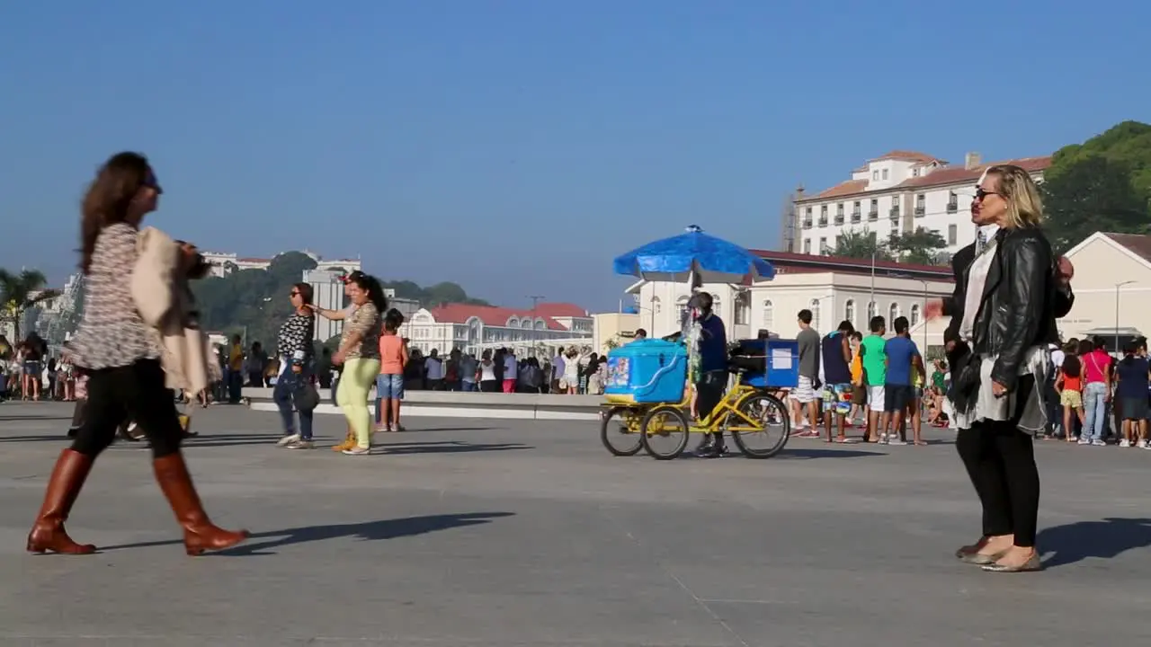 People posing for a photo at Praca Maua at sunset in the center of Rio de Janeiro Brazil