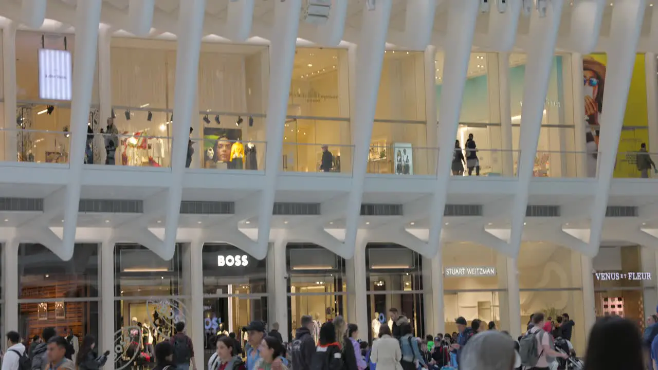 Commuters and people shopping in famous stores of Oculus Mall World Trade Center Path station New York USA