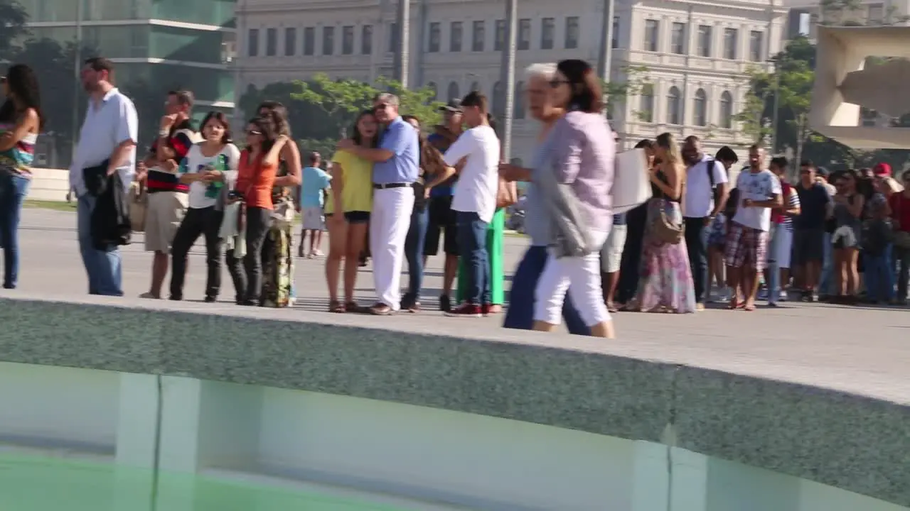 People in line in front of Museu do Amanha Tomorrow's museum at Praca Maua in the center of Rio de Janeiro Brazil on a Sunday afternoon