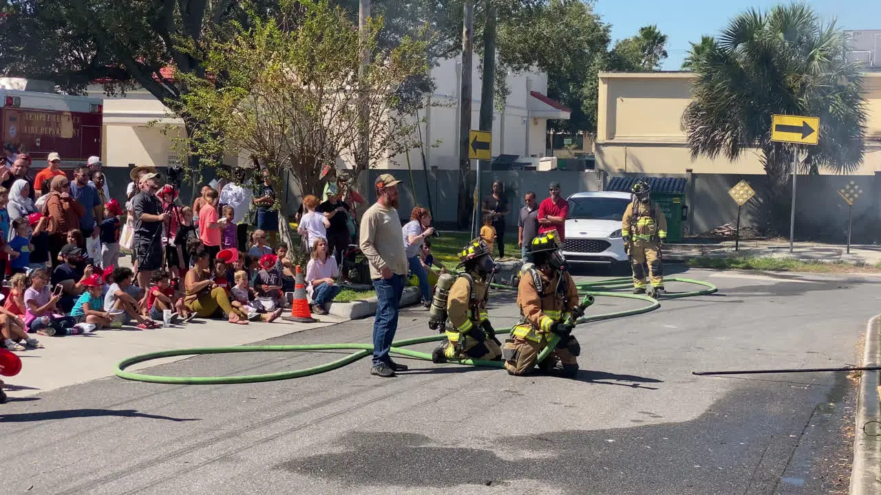 Side angle shot of The Florida Fire Sprinkler Association performing an on site education program on fire sprinkler saving lives Florida