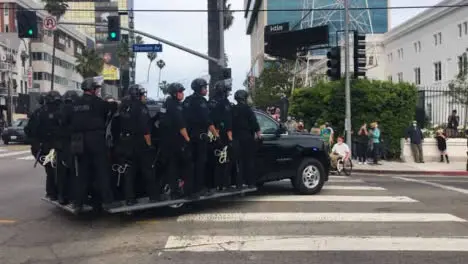 Hollywood Police Vehicles Carrying Officers Driving Past