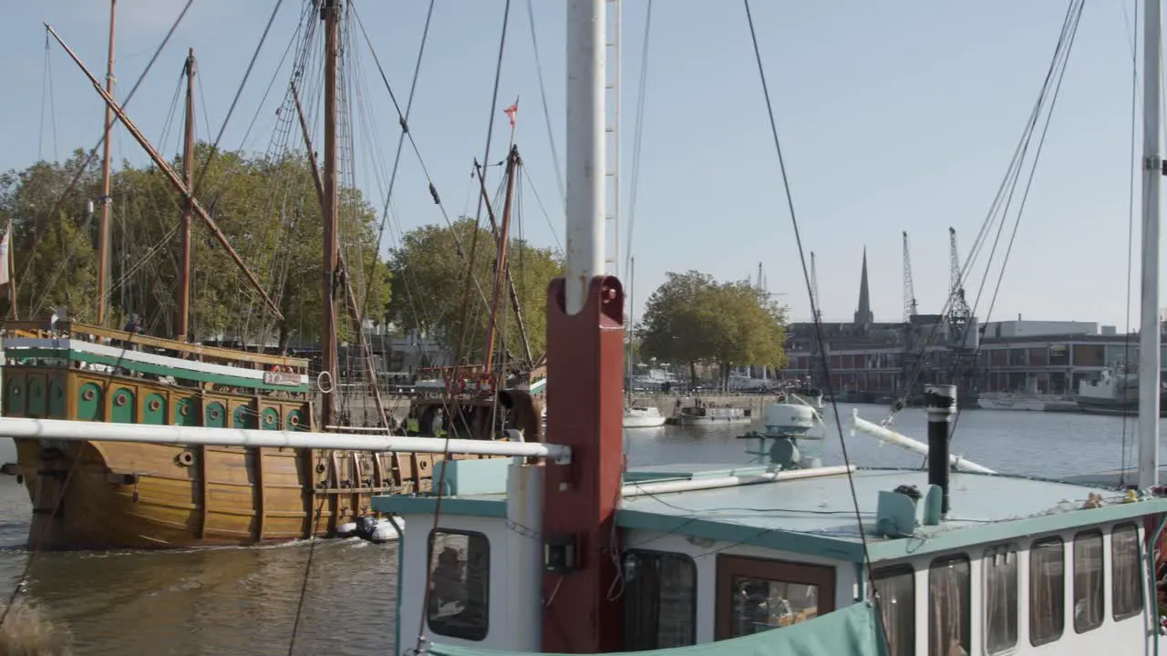 Panning Shot of Vintage Ship Sailing Through Bristol Marina In Bristol England