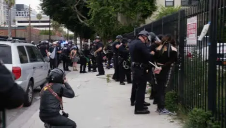 Hollywood Protesters Arrested and Zip Tied against Fence