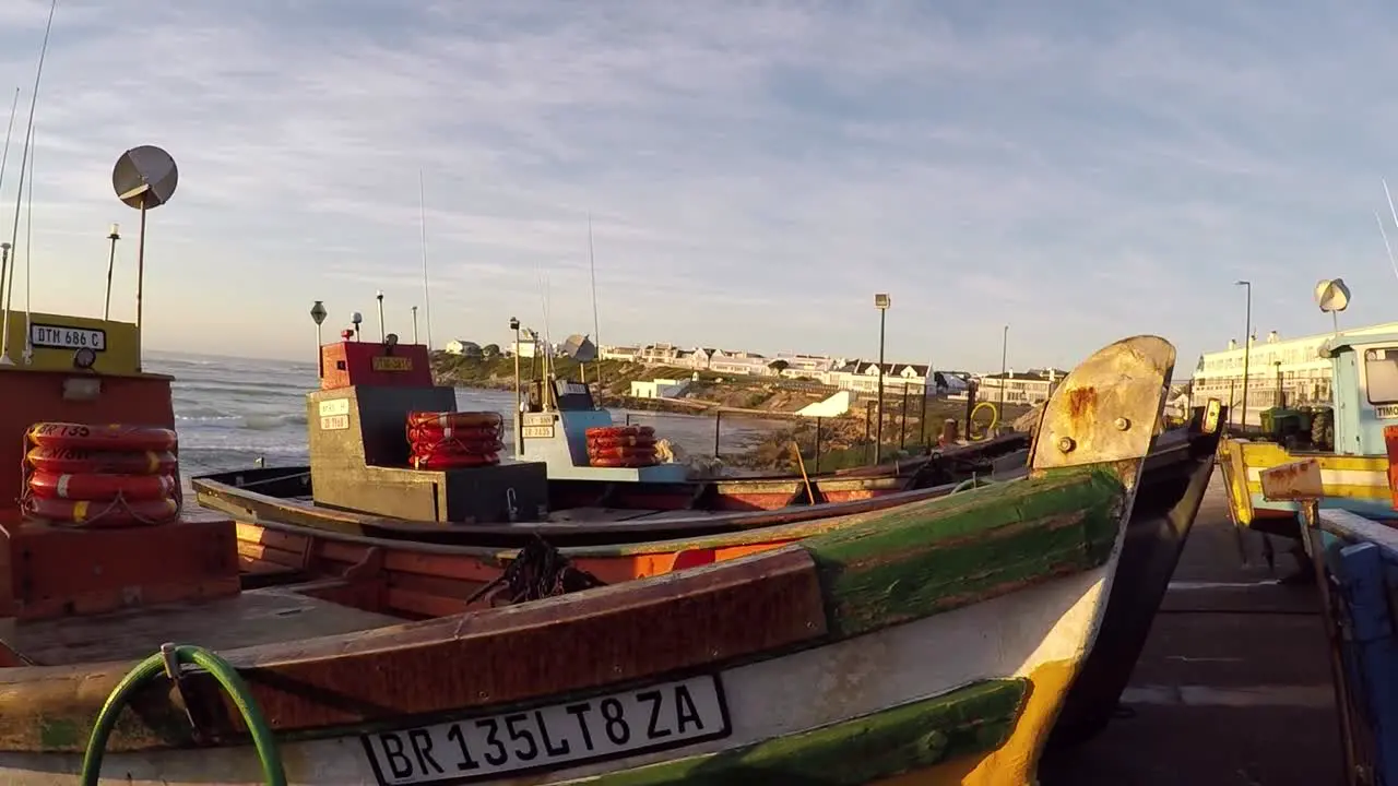 Local fishing boats in Arniston await an opportunity to go out on an early winter morning