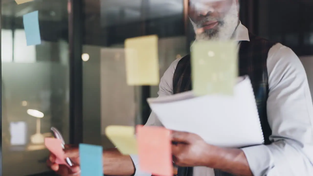 Strategy planning and black man with sticky notes