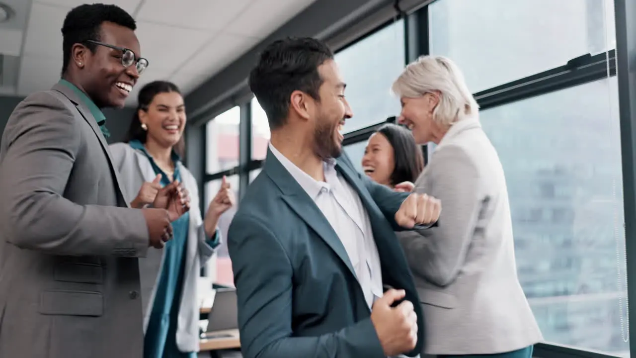 Business people dance and staff with celebration