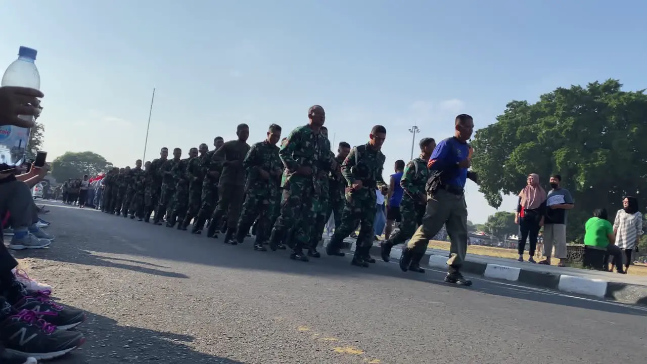 Rows of Indonesian soldiers and students ran neatly training to prepare for Indonesia's independence celebrations