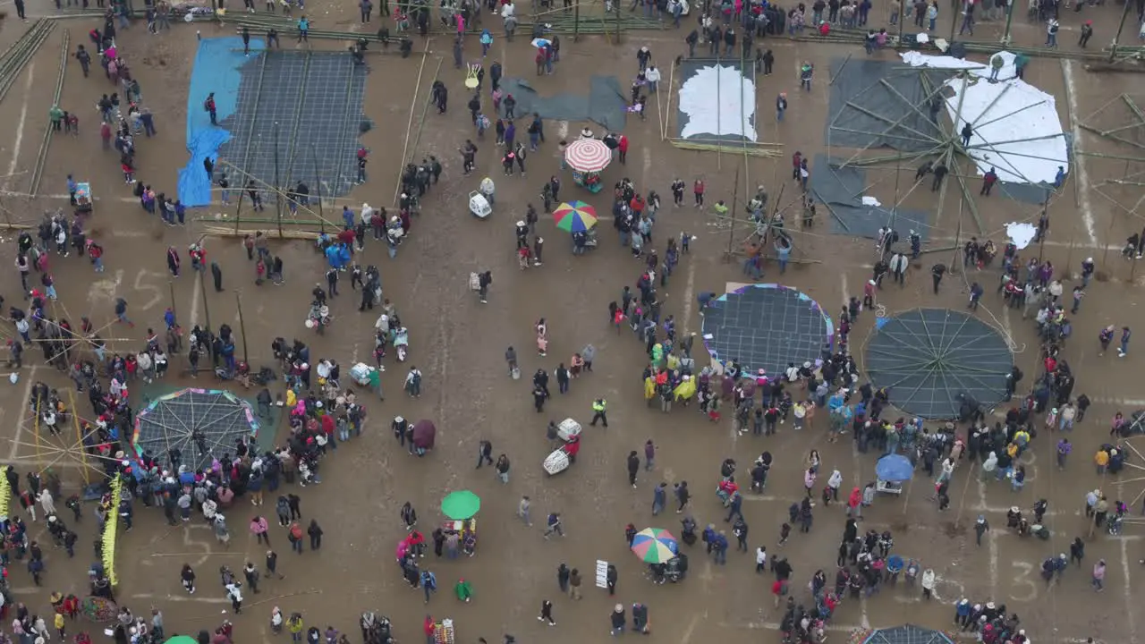 Tilt up shot of Sumpango Kite Festival 2023 Guatemala aerial