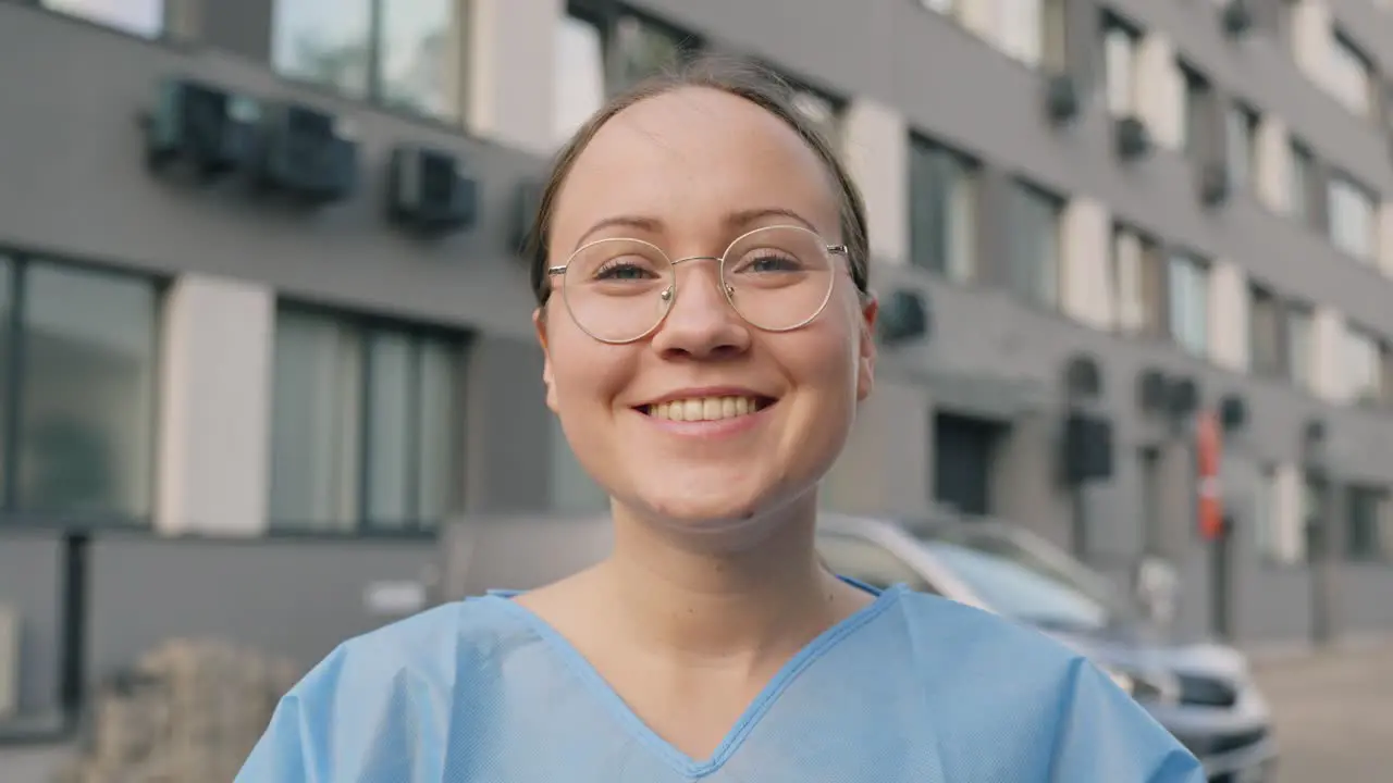 Portrait of happy nurse before workday close up