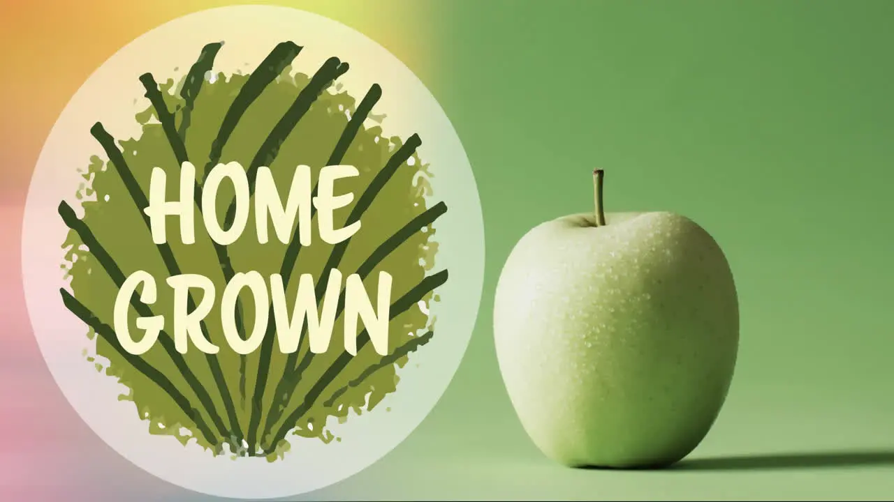 Composition of home grown text green apple on green background