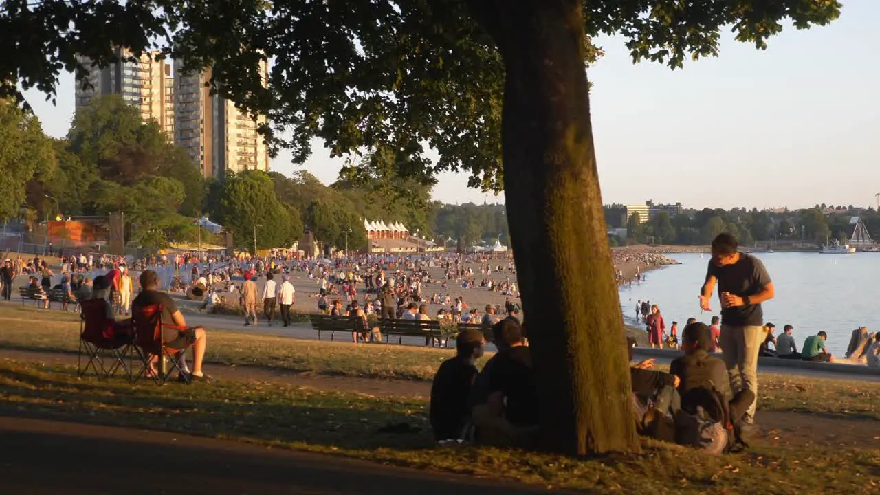 Crowded People At The Famous Holiday Beach In Vancouver City BC Canada