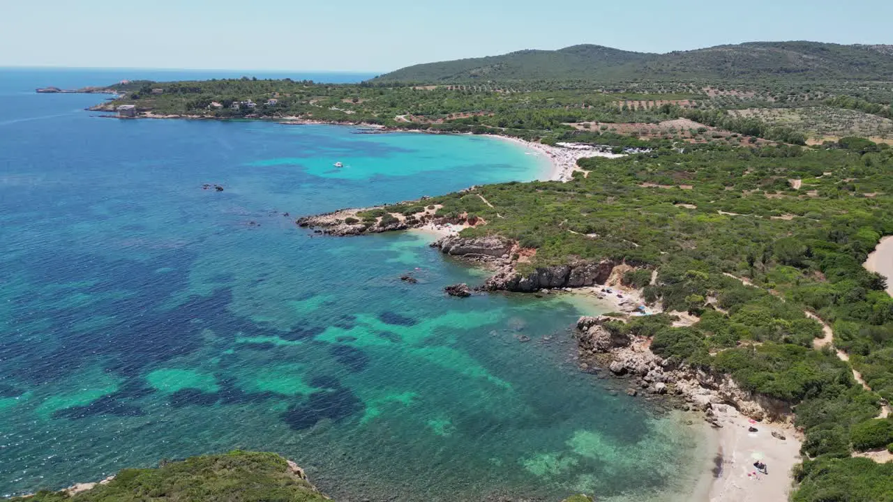 Small coves and Cala Spinosa Beach at Capo Testa Santa Teresa di Gallura Sardinia Italy 4k Aerial