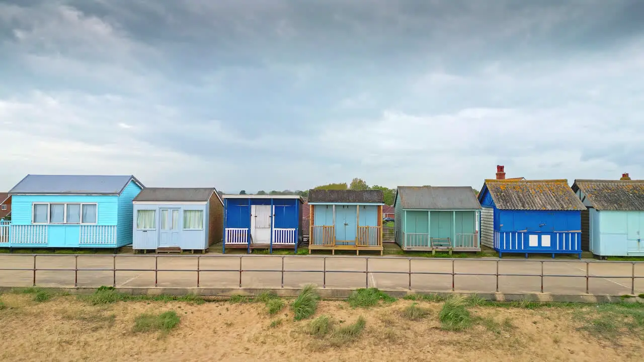 Aerial scenes capture Mablethorpe's essence featuring beach huts sandy beaches amusement parks rides and the lively tourist scene