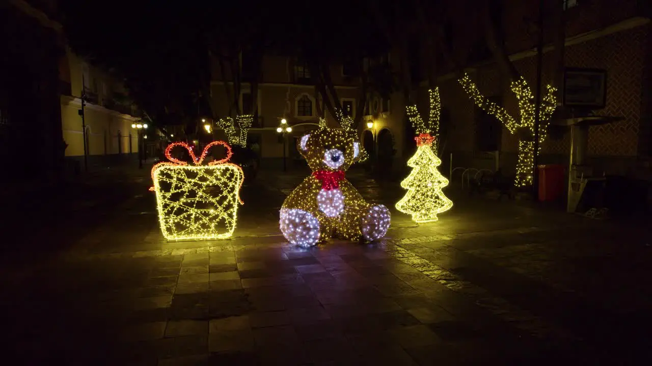 Drone video of the Christmas lights and decorations in the park at Puebla City