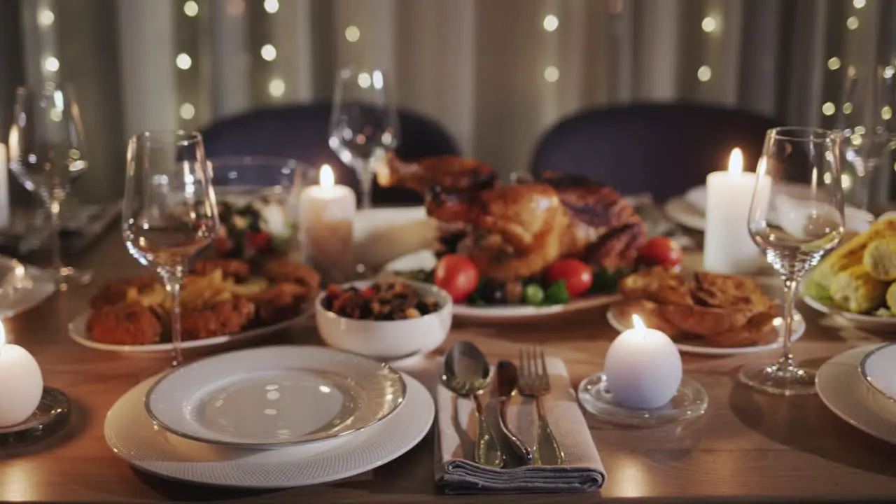 Thanksgiving holiday table with turkey in the center of the table