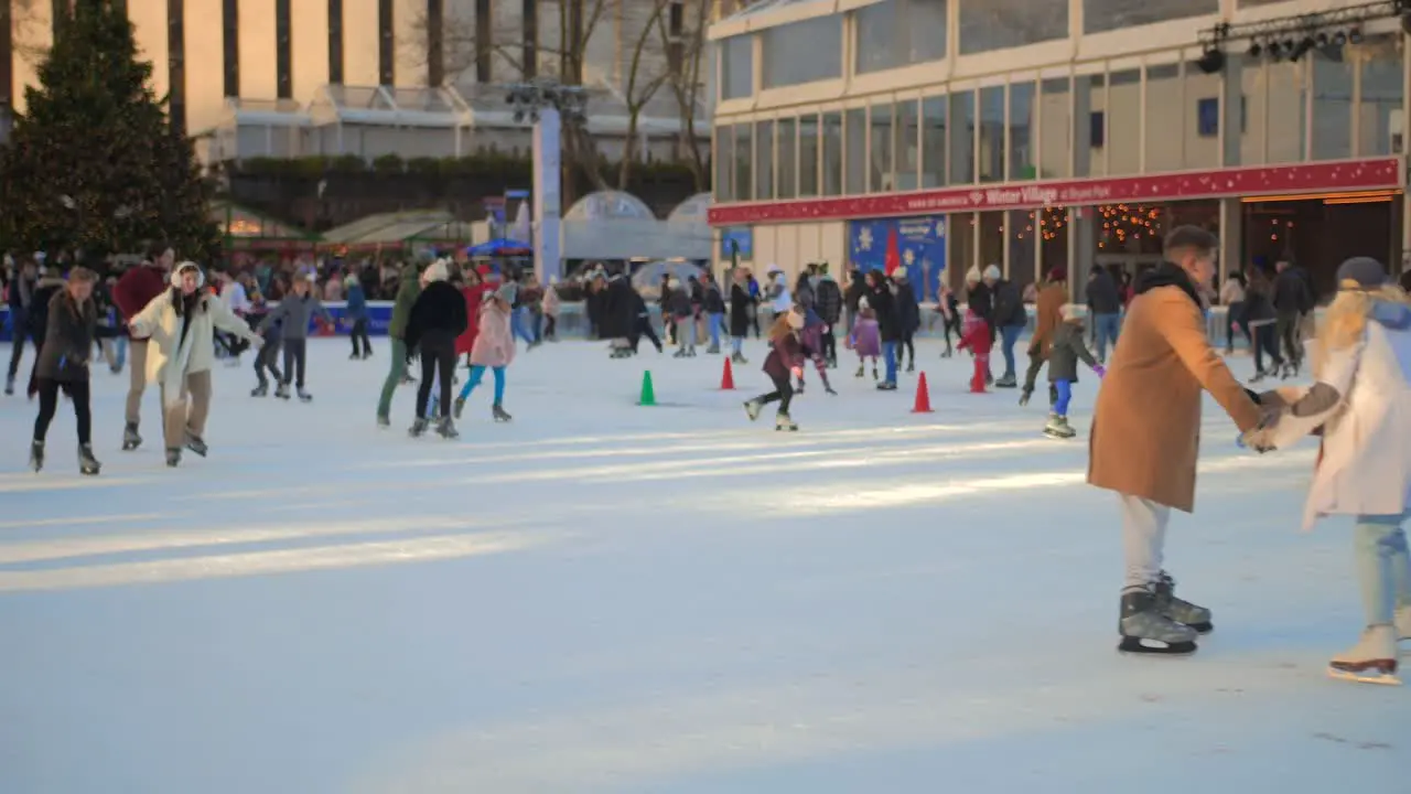 Slow motion shot of people ice skating