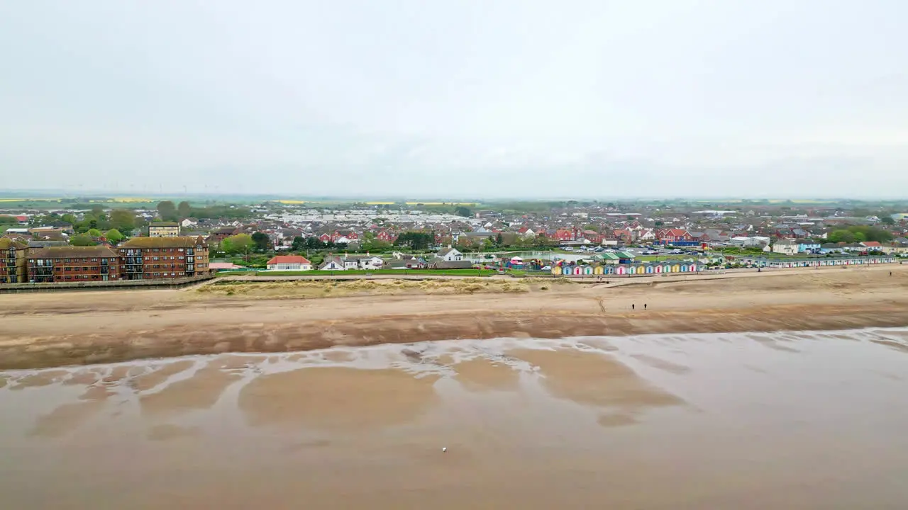 See Mablethorpe's coastal allure like never before in aerial video showcasing beach huts sandy beaches amusement parks rides and the holidaymakers' joy