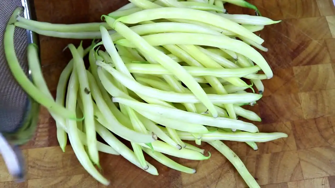 Empty Washed Butter Beans from Strainer on to Cutting Board