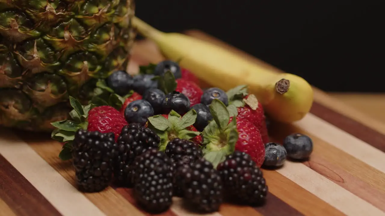 Fruits spinning on a cutting board-3