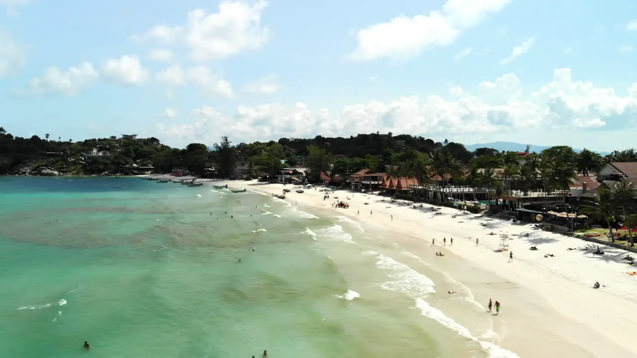 Flight over the ocean with beach on background