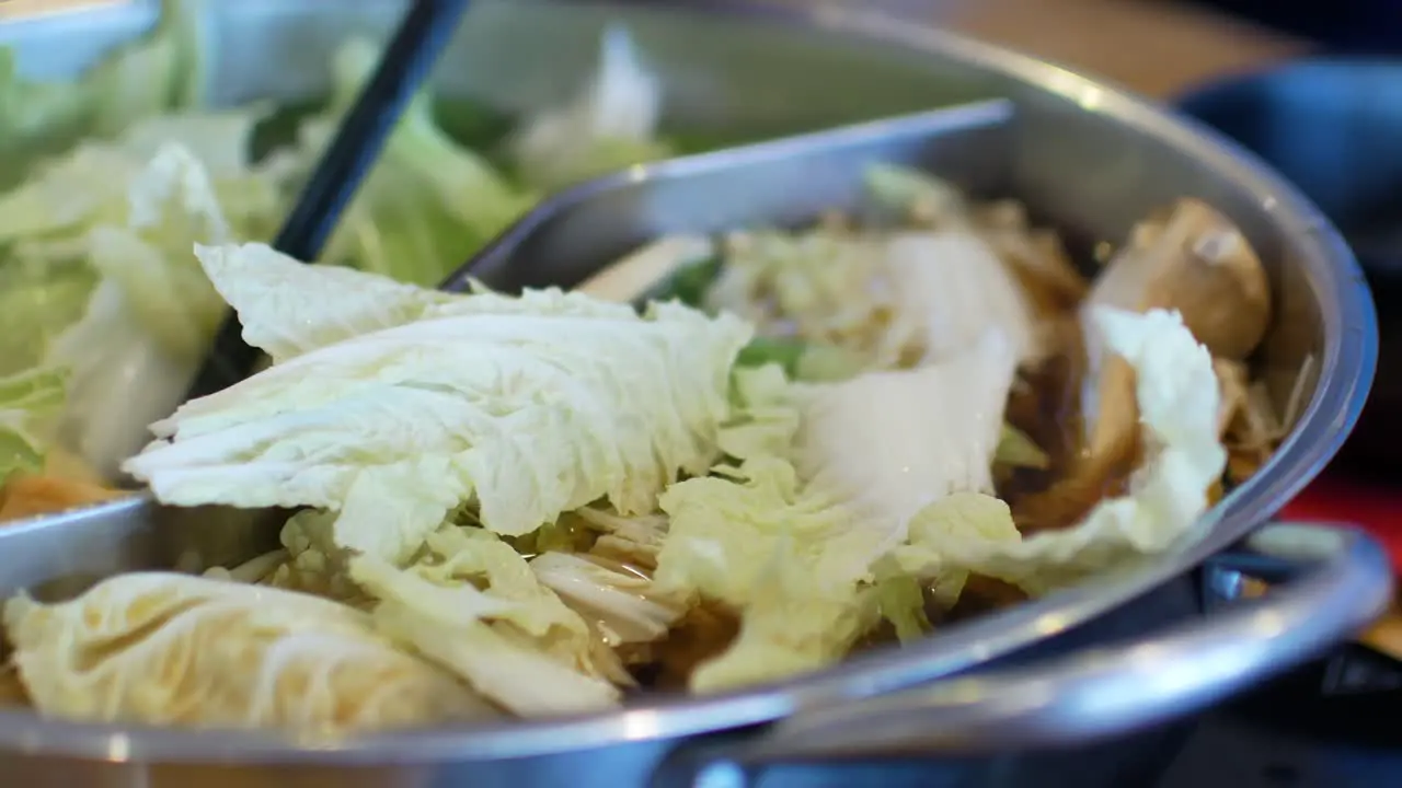 4k video POV to the hotpot shabu shabu in chinese style in pot