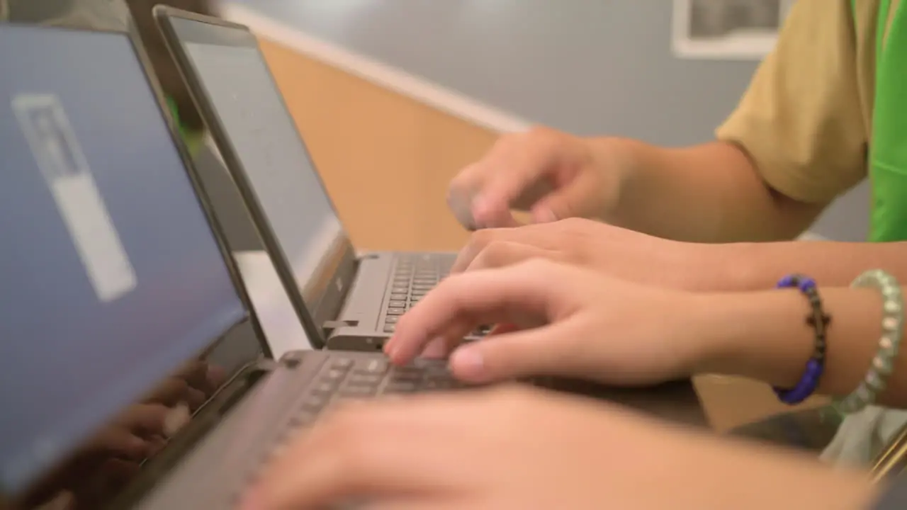 Female Student Friends Working On Their Laptop