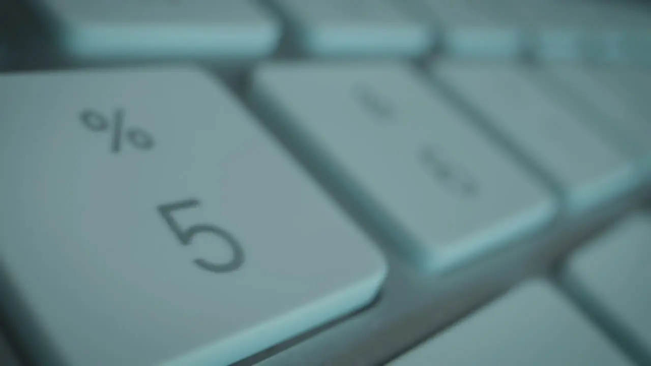 Flight over huge keys of computer keyboard