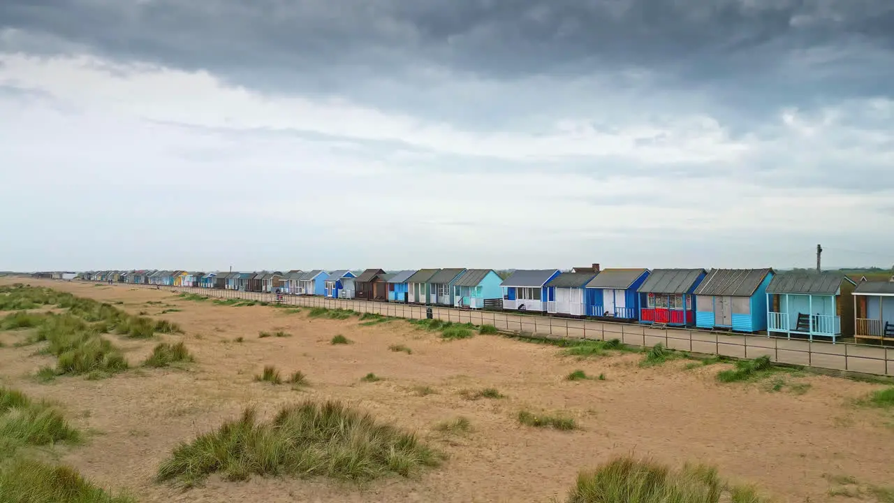 Witness the coastal allure of Mablethorpe through aerial footage highlighting beach huts sandy beaches and vibrant amusements