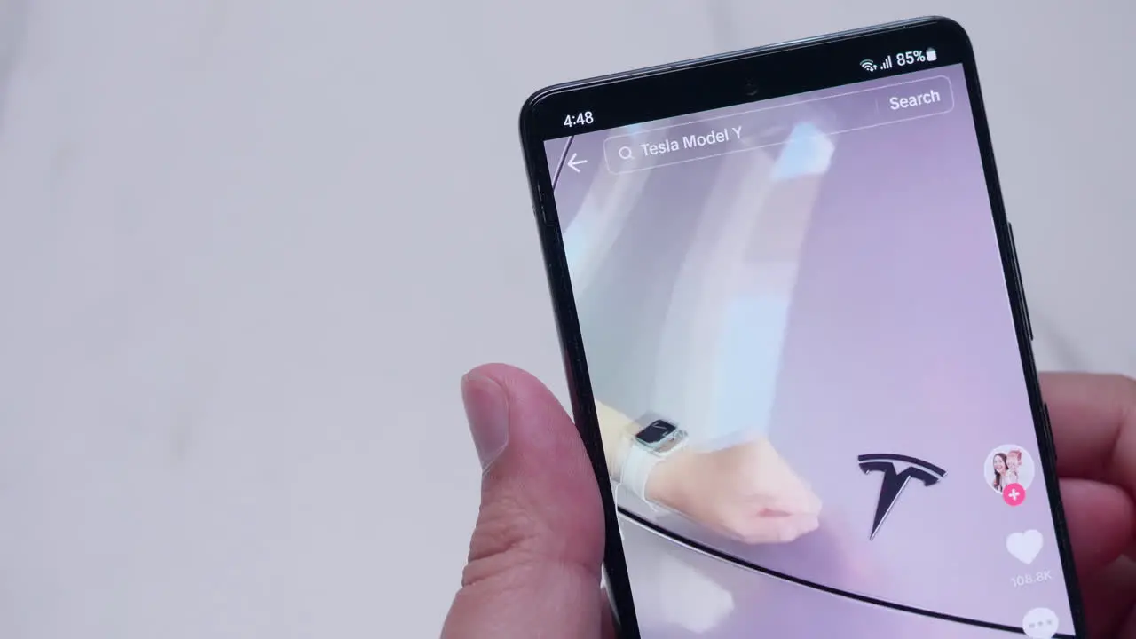 Detail of the cell phone screen using the tiktok app