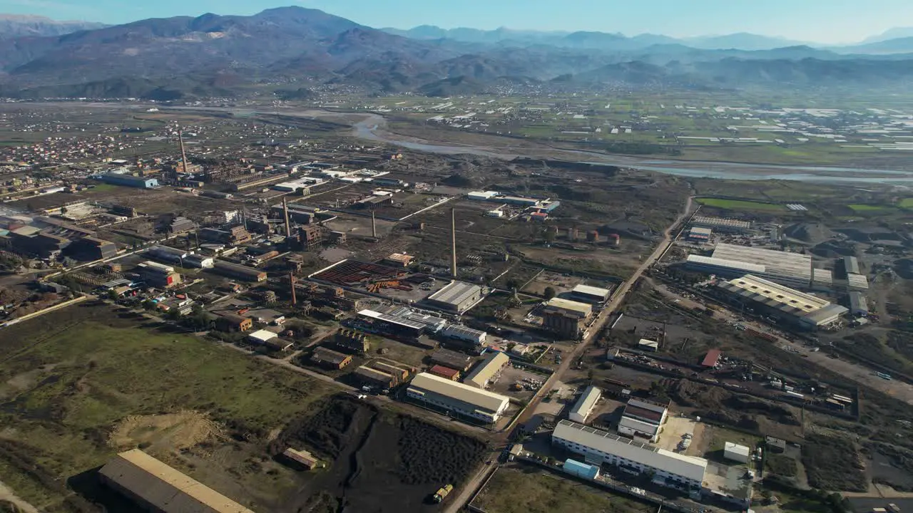 Steel factory with chimneys and warehouses on a large industrial area in Elbasan Albania