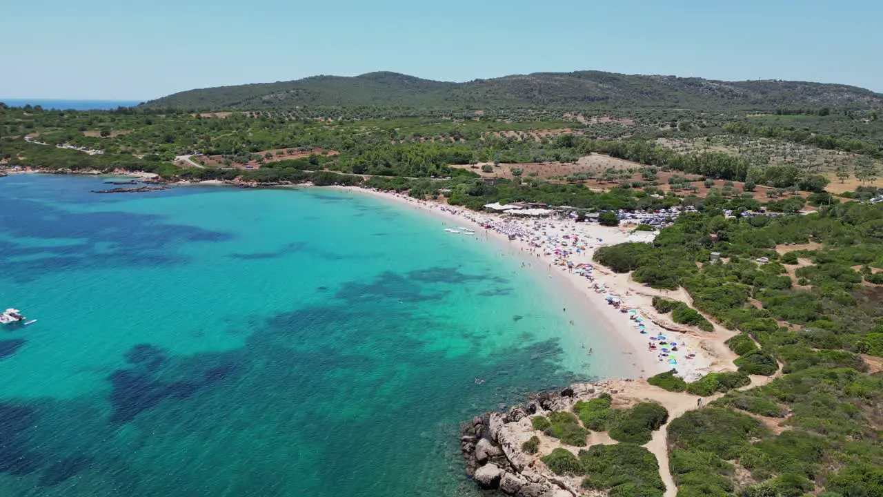 White Sandy Cala Spinosa Beach at Capo Testa Santa Teresa di Gallura Sardinia Italy 4k Aerial