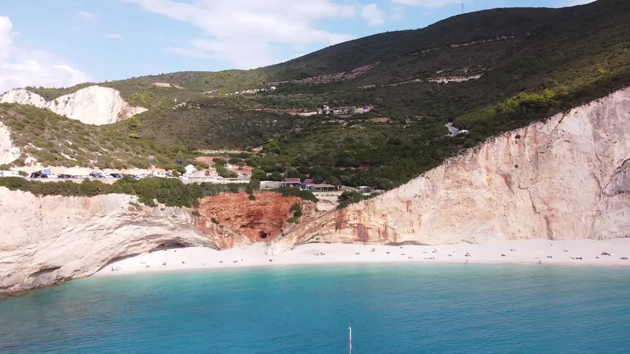 Porto Katsiki Beach and Boat at Lefkada Island Greece Reversing Aerial