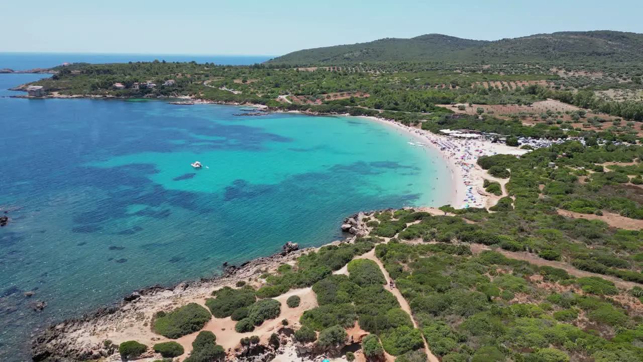 Small cove and Cala Spinosa Beach at Capo Testa Santa Teresa di Gallura Sardinia Italy 4k Aerial