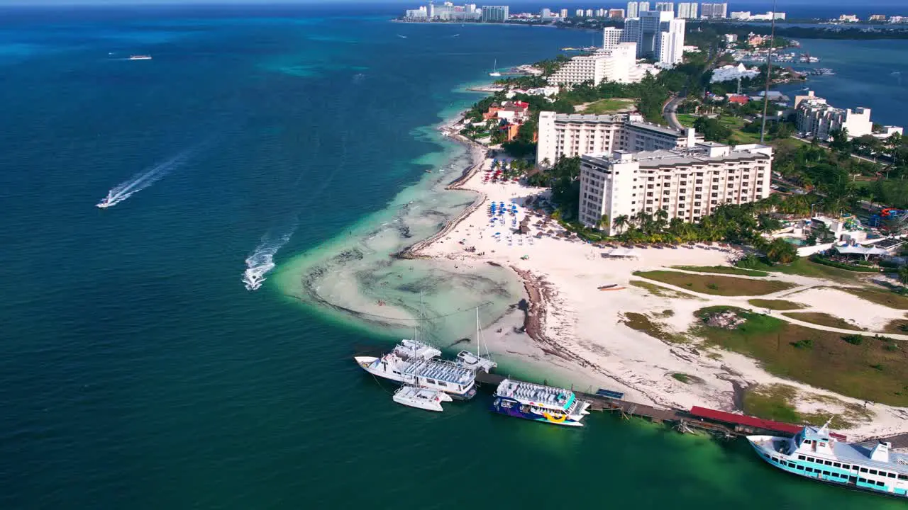 Tropical Blue Ocean With White Sand Beach And Resorts On Playa Delfines Cancun Mexico 4K Drone Flyover