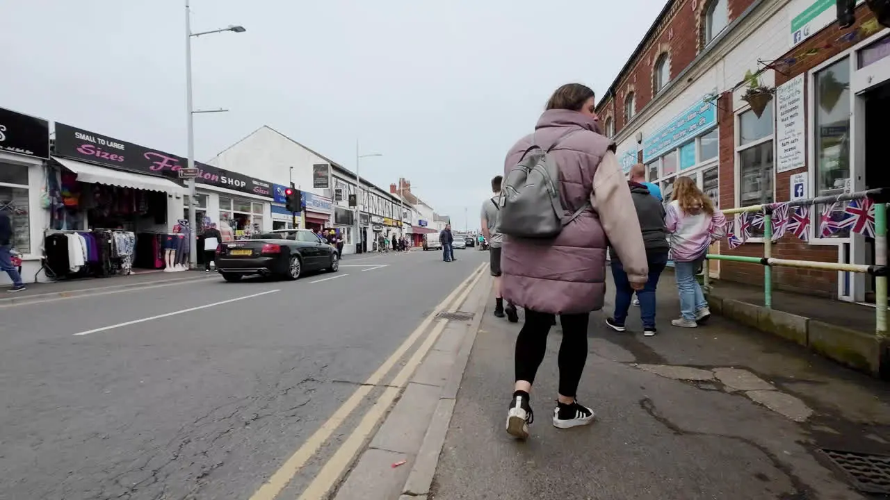 Experience Mablethorpe's coastal enchantment from above in Lincolnshire showcasing beach huts sandy shores and the lively amusement parks drawing crowds of tourists