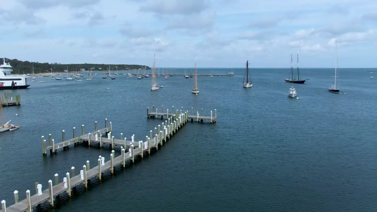 Sailboats Anchored Near The Jetty In Vineyard Heaven Pier In Cape Cod Ma USA