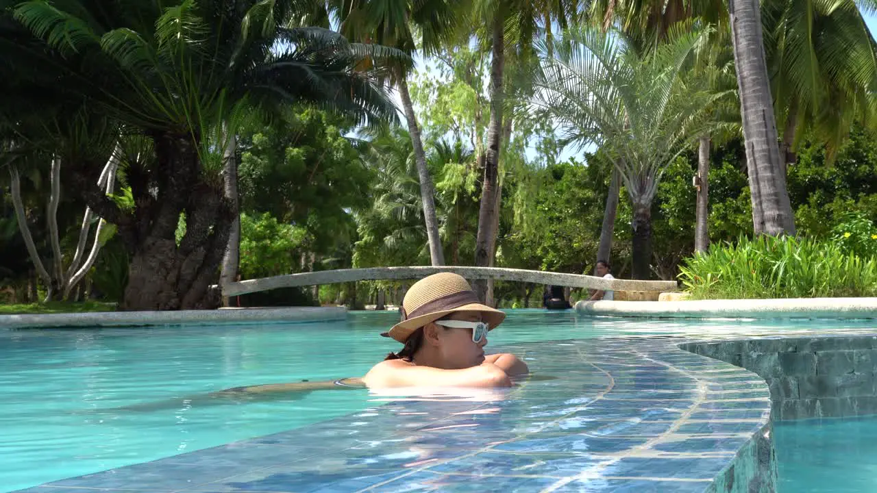 A Gorgeous Woman Relaxing In Swimming Pool Of Dos Palmos Island Resort In Puerto Princesa Palawan Philippines Low-Level Shot