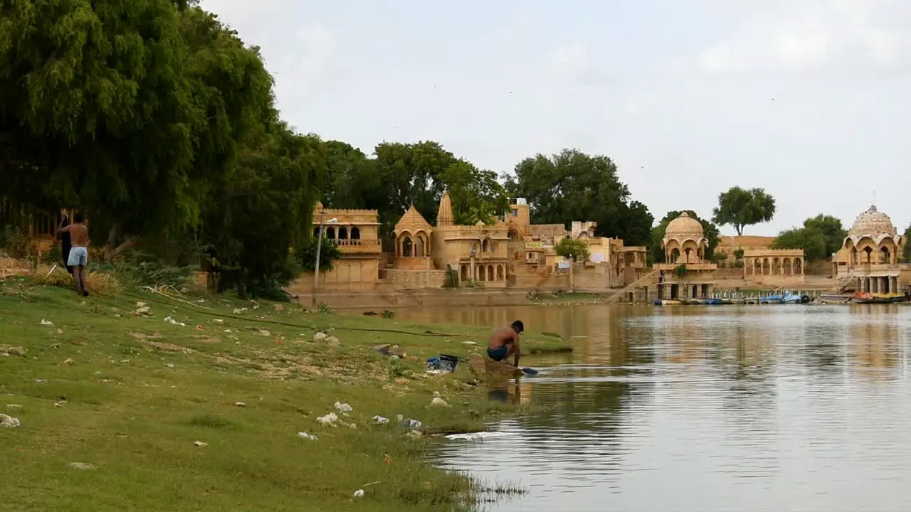 Person having a bath in lake