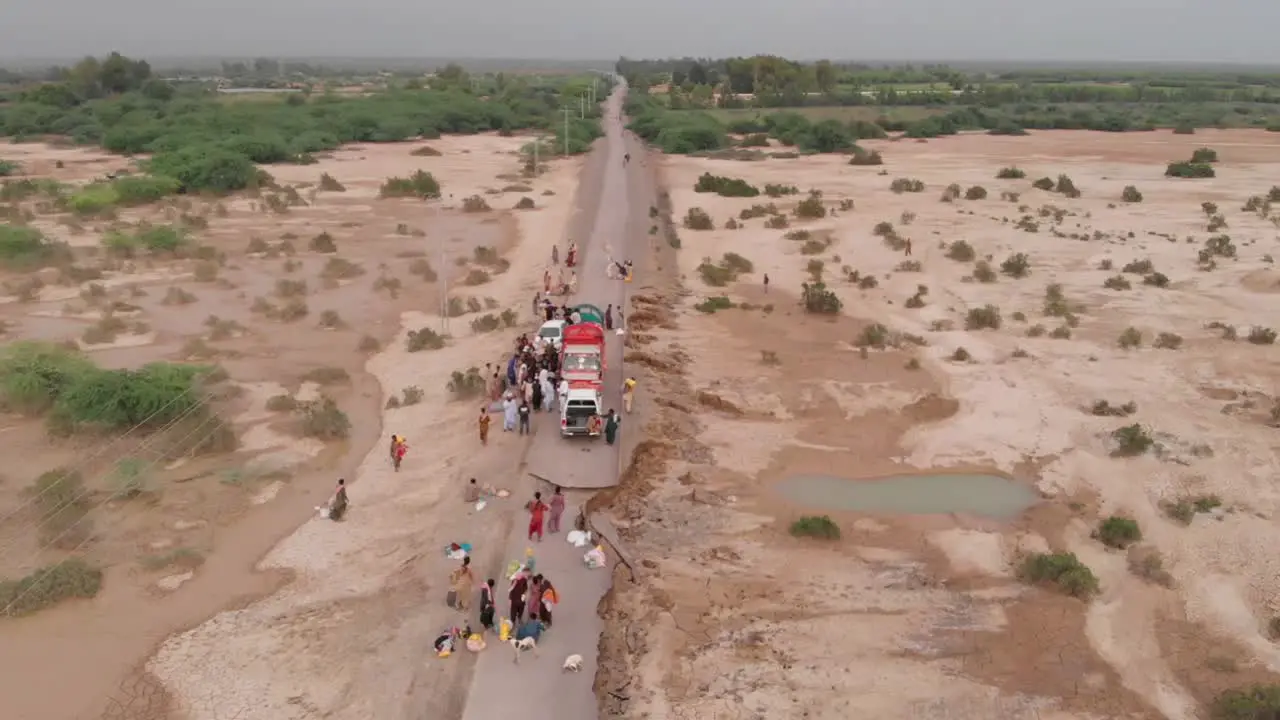 Aerial View Of Truck Providing Food Aid After Flood In Remote Area In Balochistan