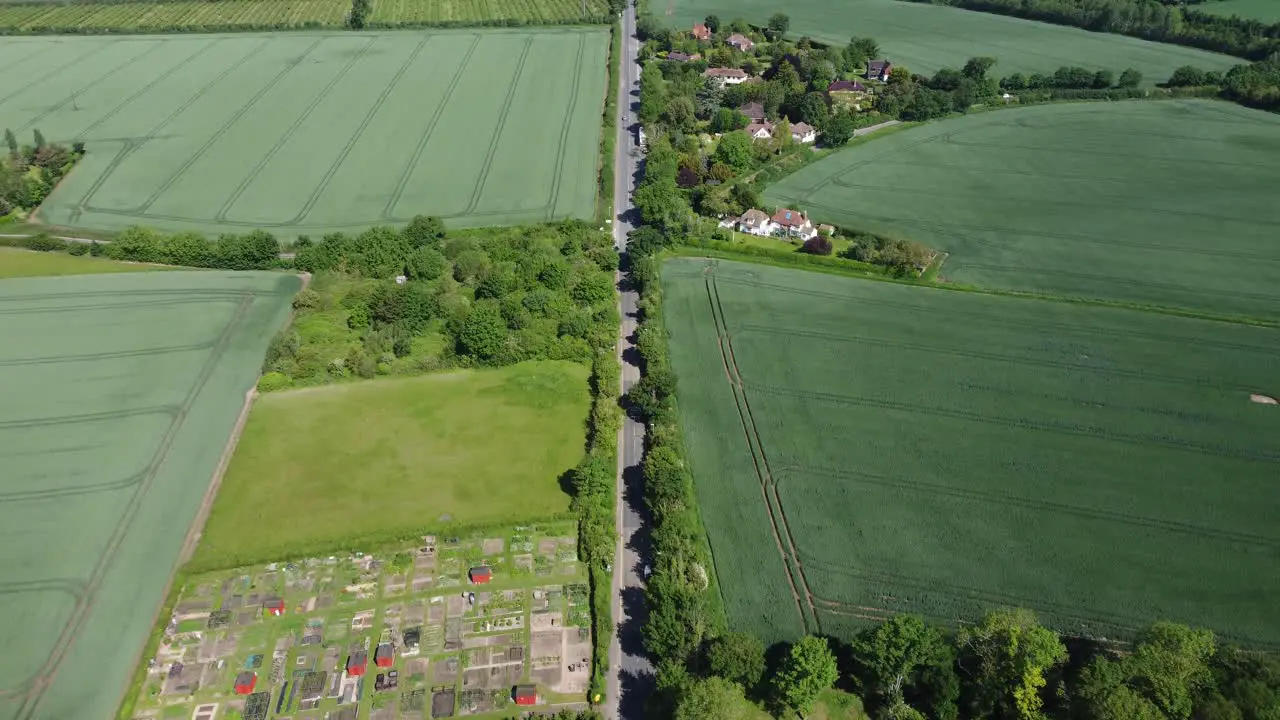 4K drone video of the village of Bridge near Canterbury with green fields