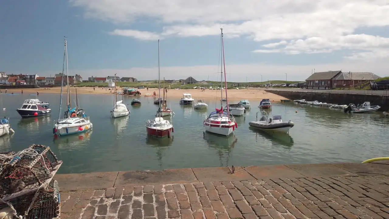 Historic harbour on the east coast of Fife Scotland basking in the sun of an early summer day