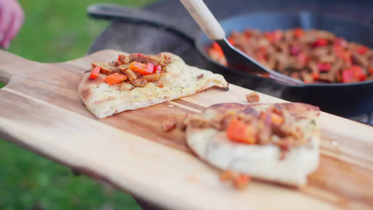 Outdoor cooking over an open fire