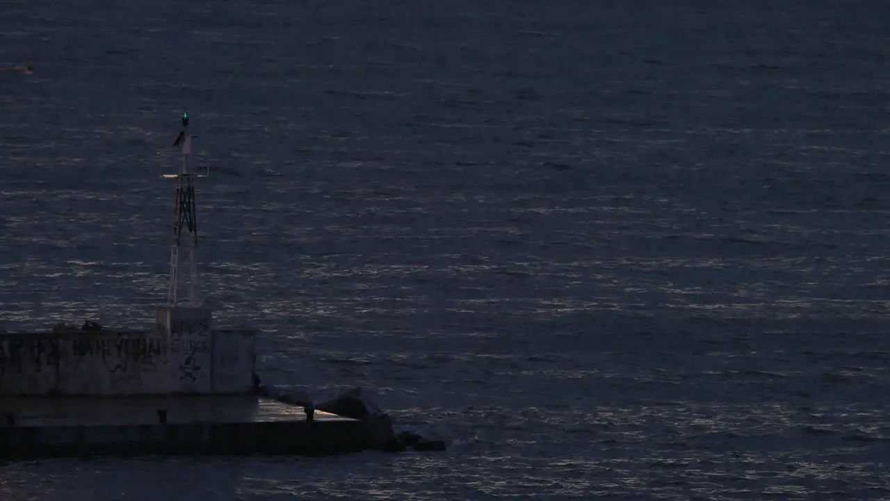 Schooner sailing in sea at night