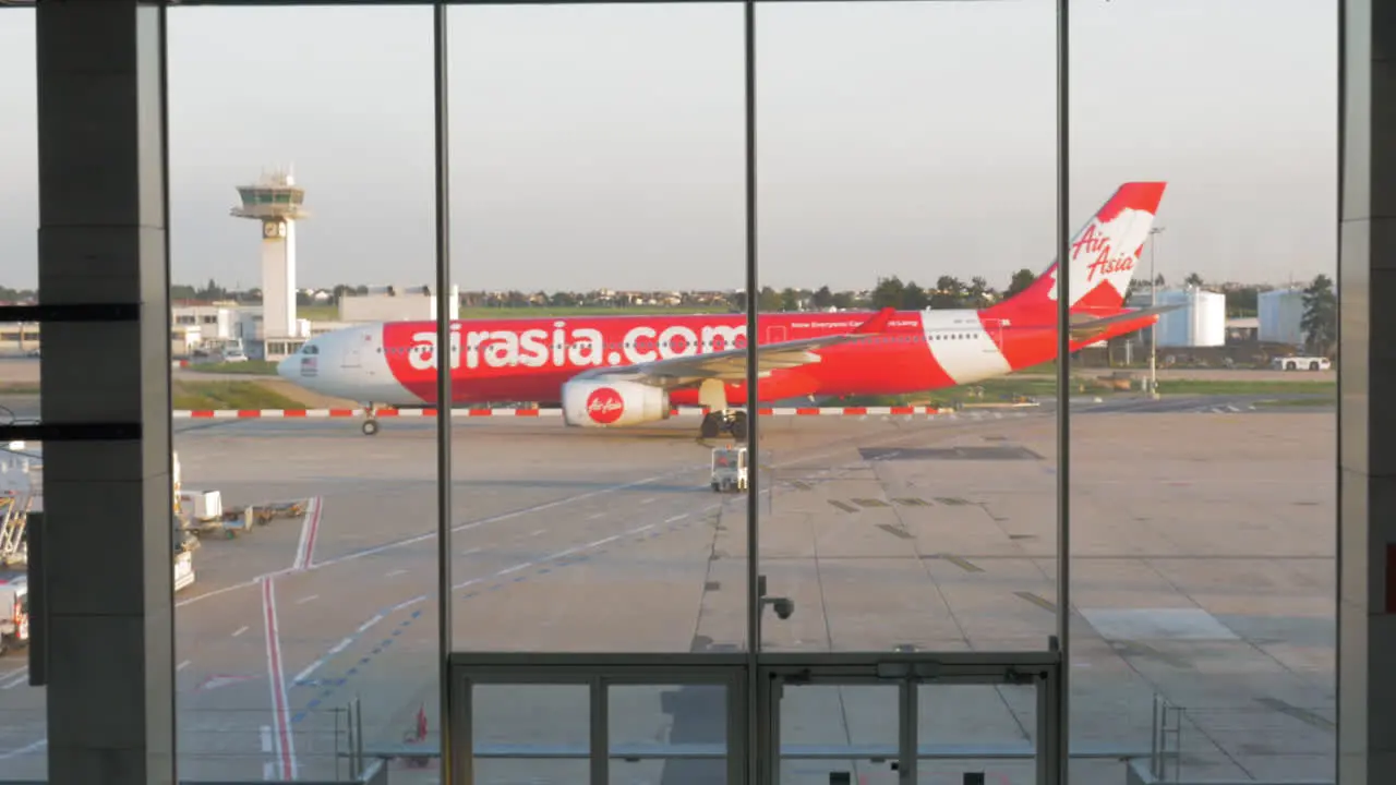 Plane of AirAsia moving on the runway