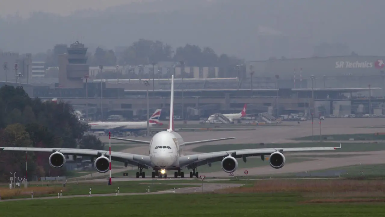 Emirates Airbus A380-800 taxiing down the runway