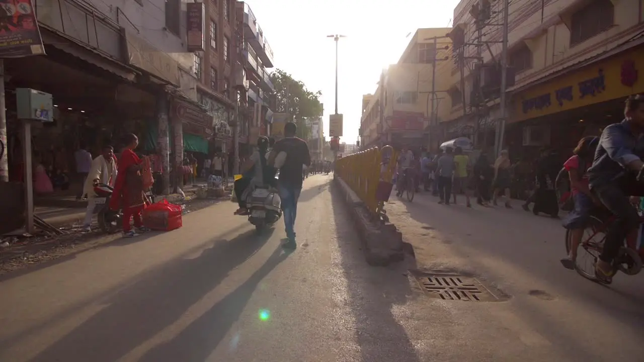 Tracking Shot Along Busy Varanasi Street