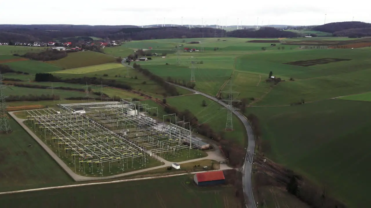 Critical Infrastructure Aerial View of Powerlines Connecting Windmills to a Power Substation in the German Power Grid in Sauerland Germany